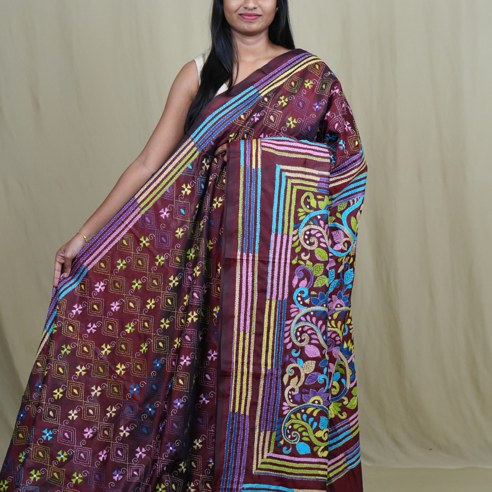 Semi Bangalore silk saree with all-over hand Kantha work and rich embroidered pallu.
