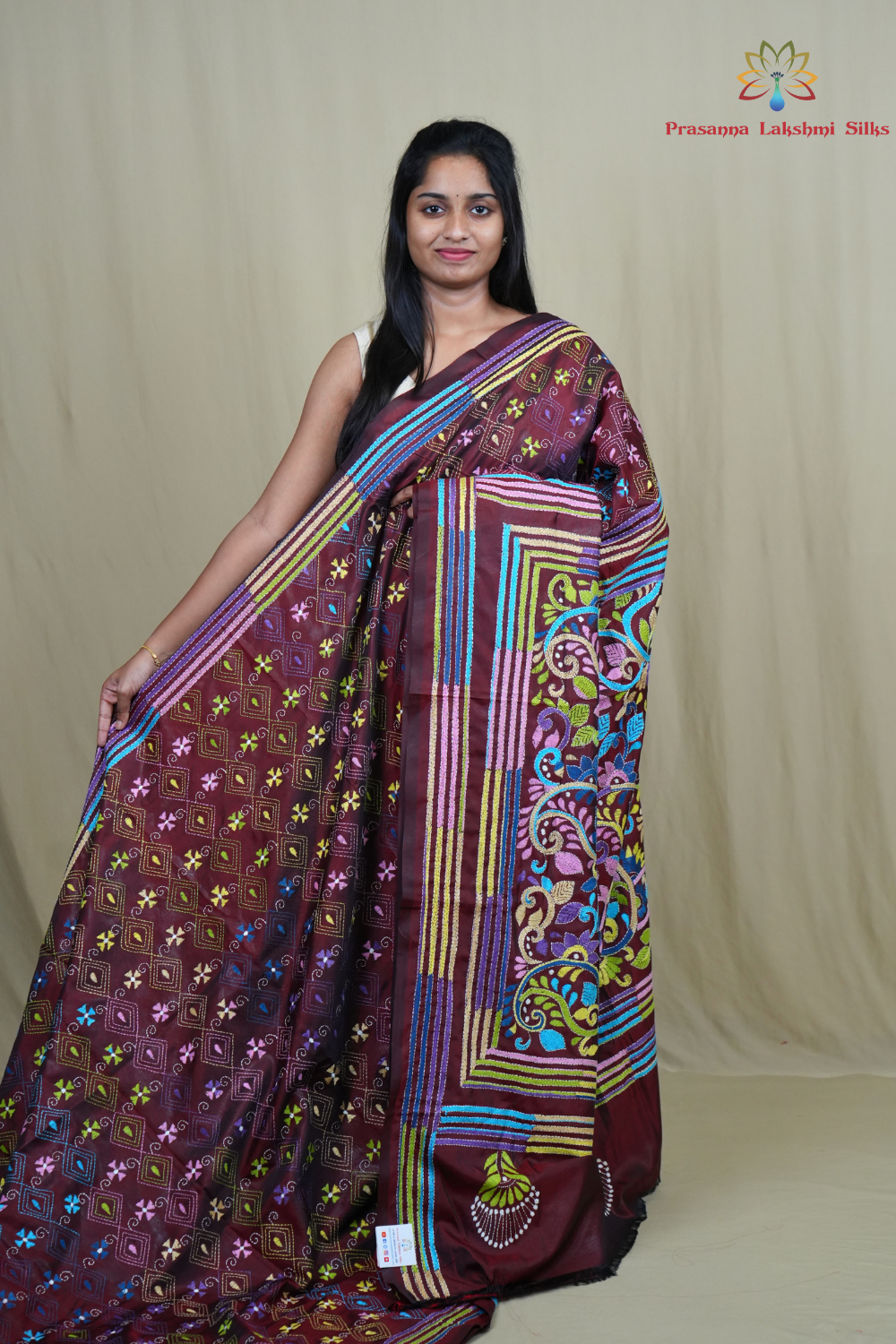 Semi Bangalore silk saree with all-over hand Kantha work and rich embroidered pallu.