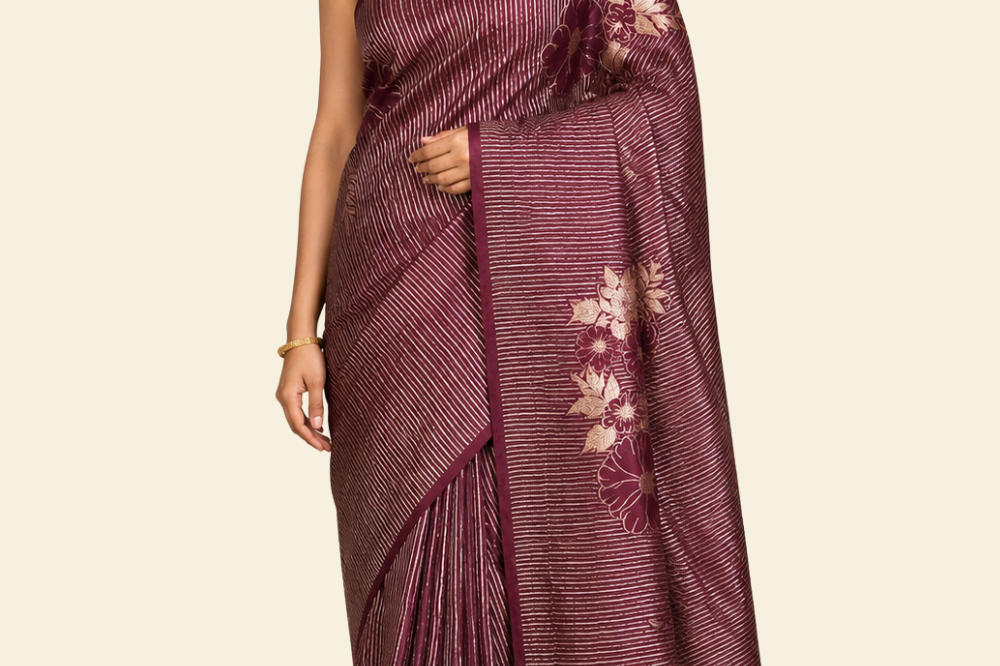 Crepe silk saree with gold and silver vertical stripes and velvet floral pallu
