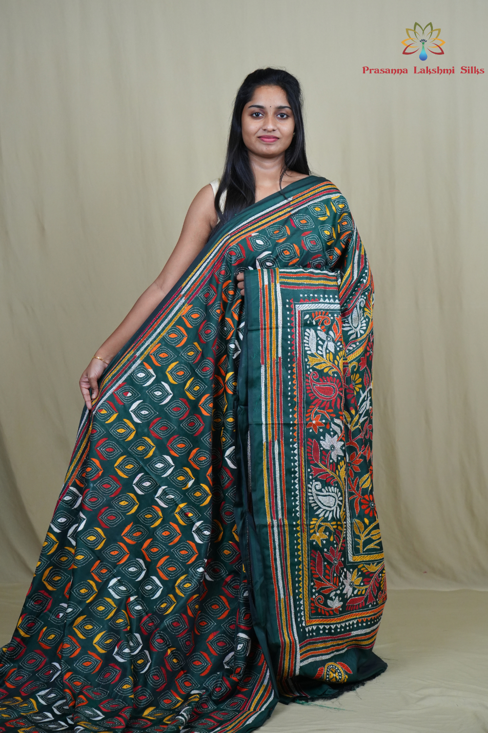 Semi Bangalore silk saree with all-over hand Kantha work and rich embroidered pallu.
