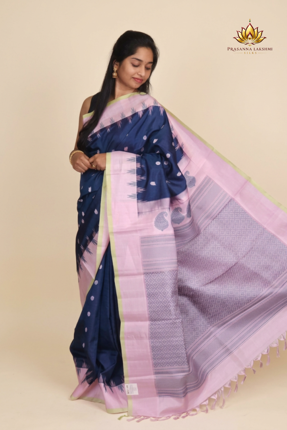 Peacock blue handloom Gadwal pure silk saree with lotus pink zari border and rich brocade pallu
