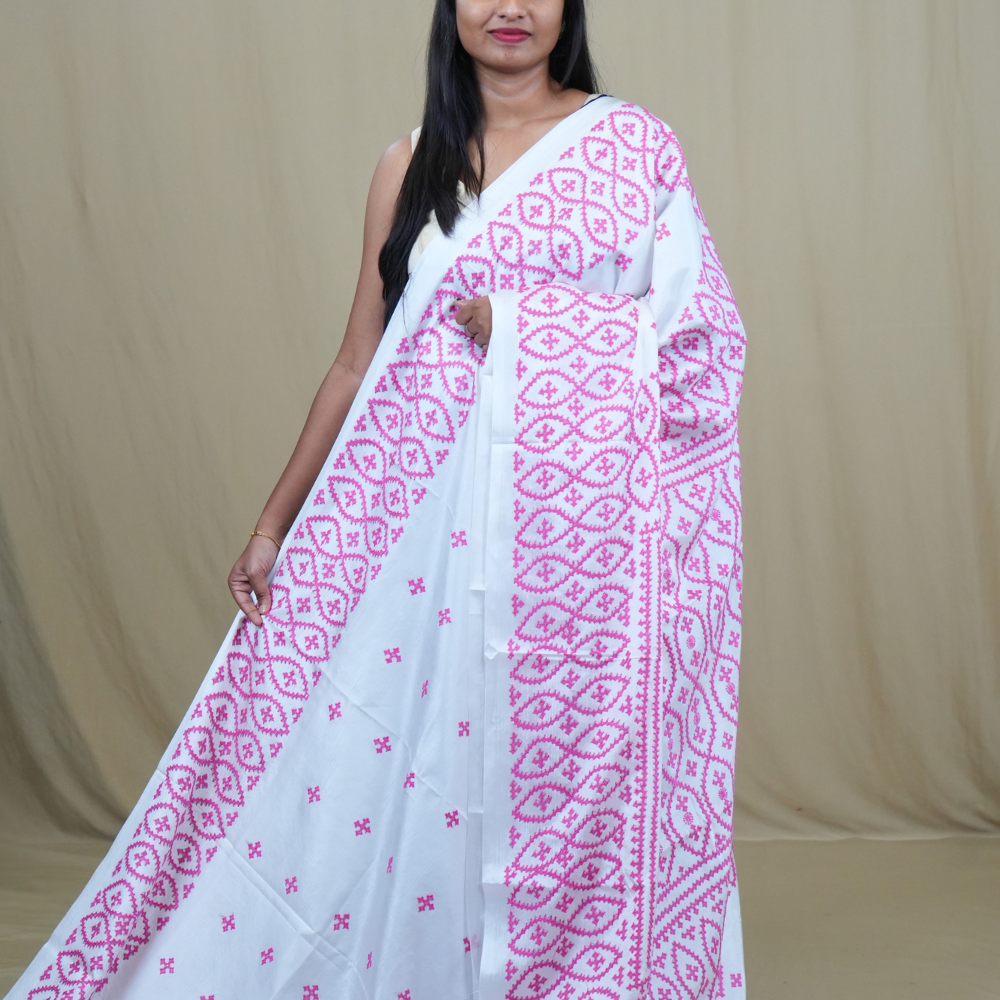 Semi Bangalore Silk Saree with all-over Kutch work motifs and rich embroidered pallu.
