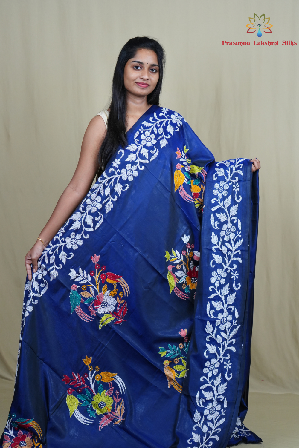 Elegant silk saree featuring Kantha work borders and detailed Kantha pallu design.
