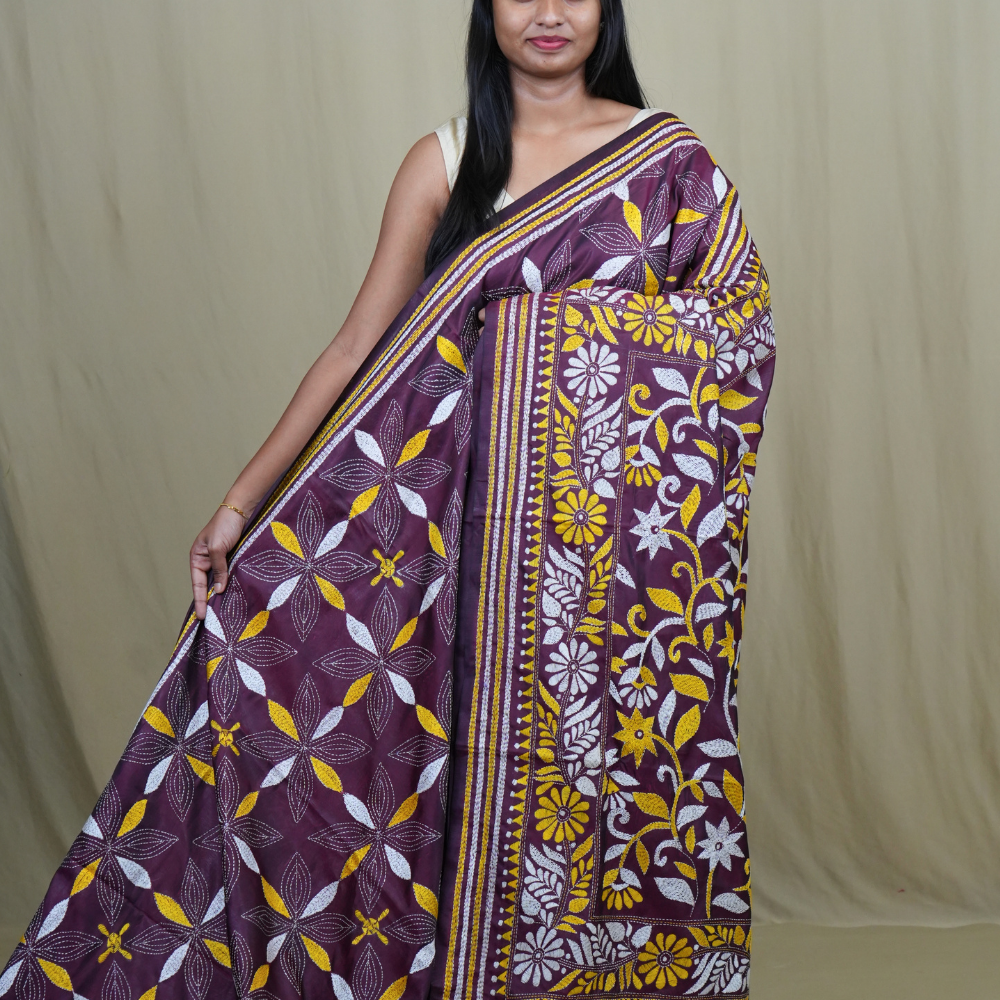 Semi Bangalore silk saree with all-over hand Kantha work and rich embroidered pallu.
