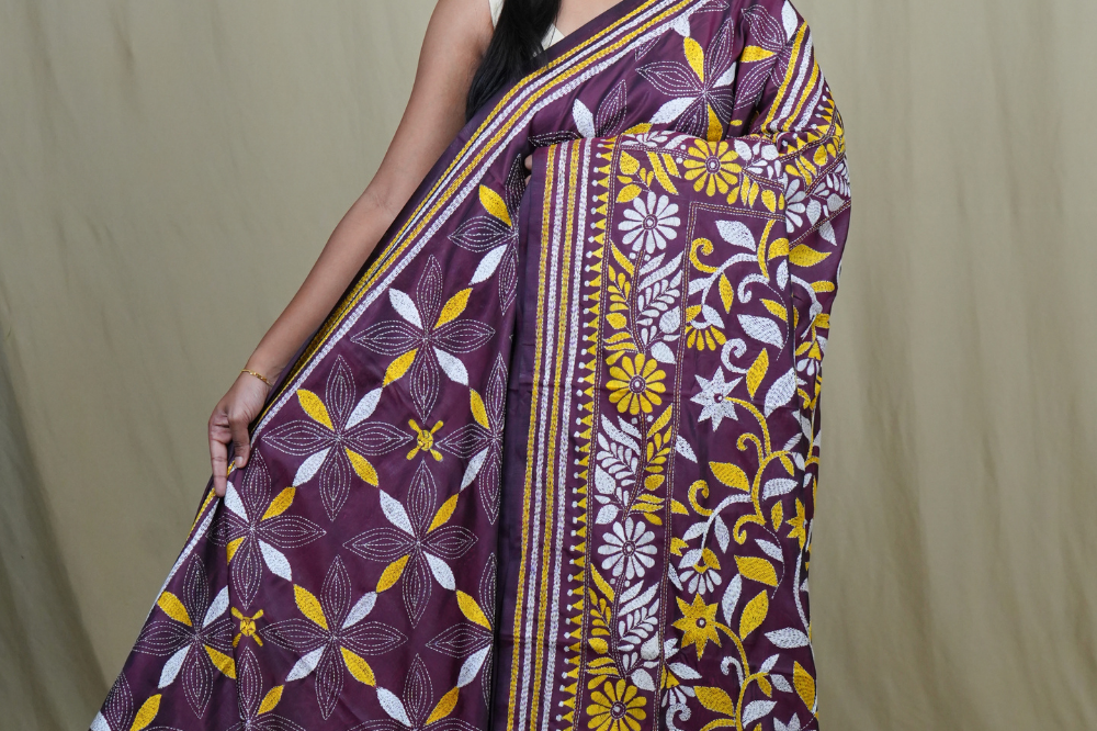 Semi Bangalore silk saree with all-over hand Kantha work and rich embroidered pallu.
