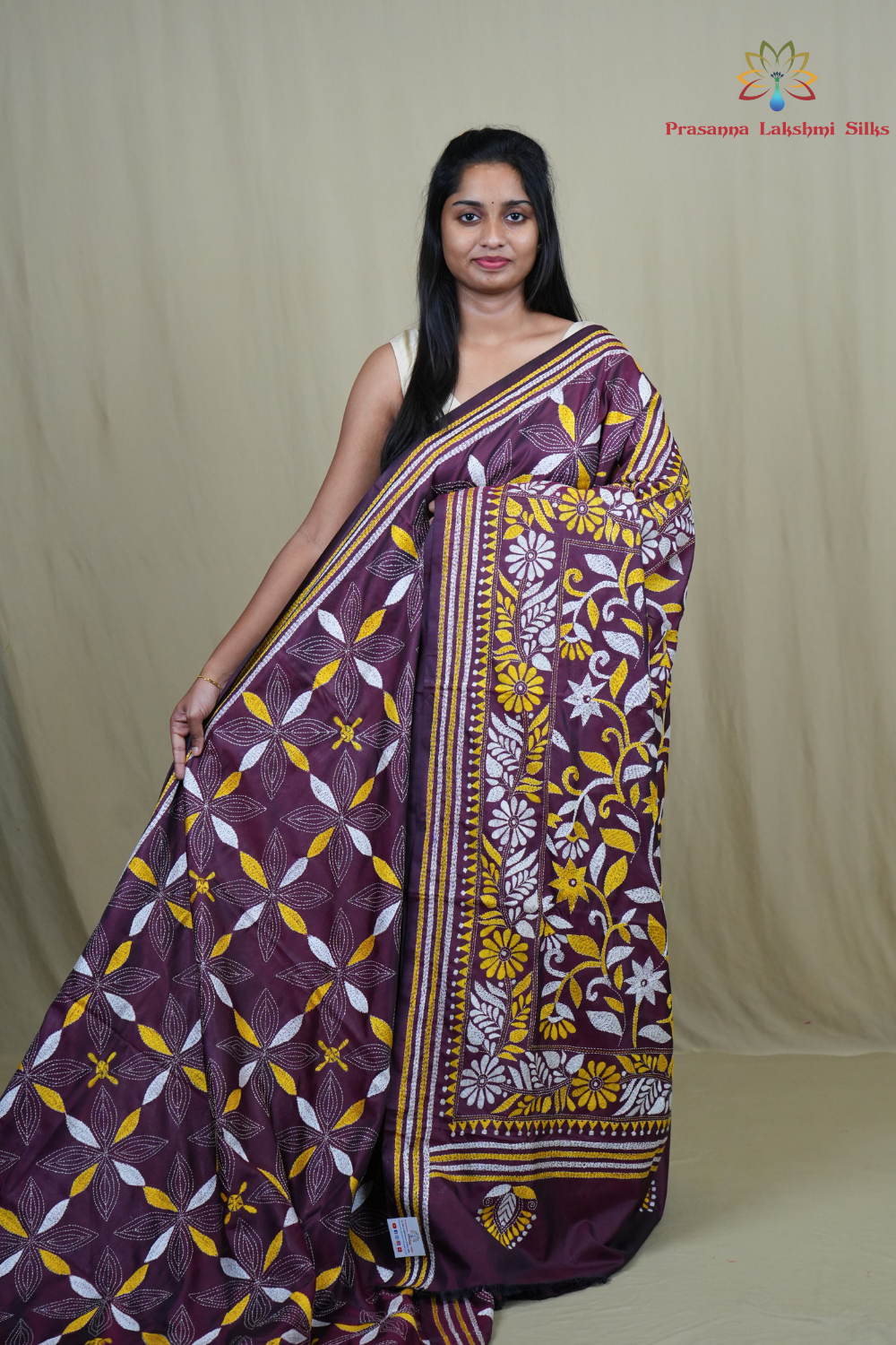 Semi Bangalore silk saree with all-over hand Kantha work and rich embroidered pallu.
