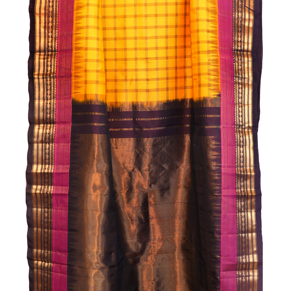 Elegant handloom Gadwal pure silk saree suitable for weddings and grand celebrations.