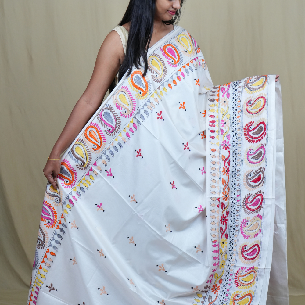 Elegant silk saree featuring Kantha work borders and detailed Kantha pallu design.
