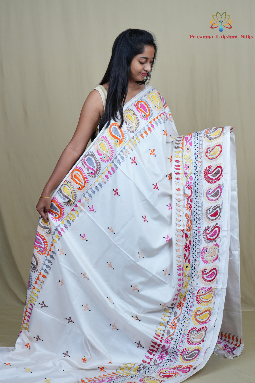 Elegant silk saree featuring Kantha work borders and detailed Kantha pallu design.
