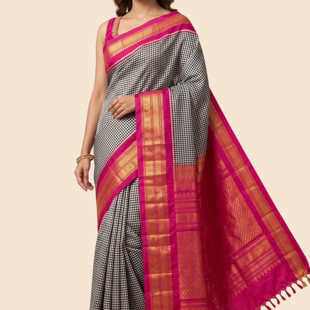 Handloom Gadwal pure silk saree with classic checks pattern and rich zari brocade pallu.
