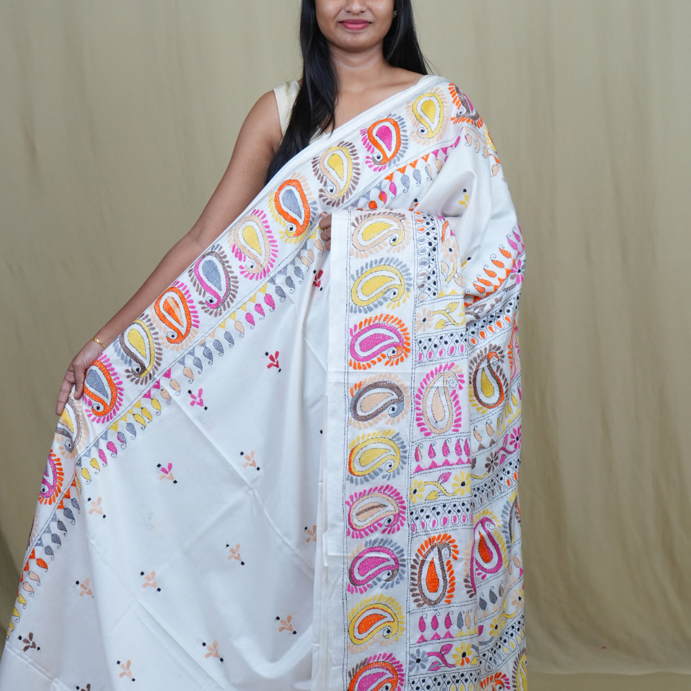 Semi Bangalore silk saree with all-over hand Kantha work and rich embroidered pallu.
