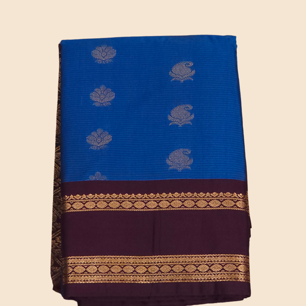 Handloom semi Gadwal saree featuring rich brocade pallu and contrast blouse
