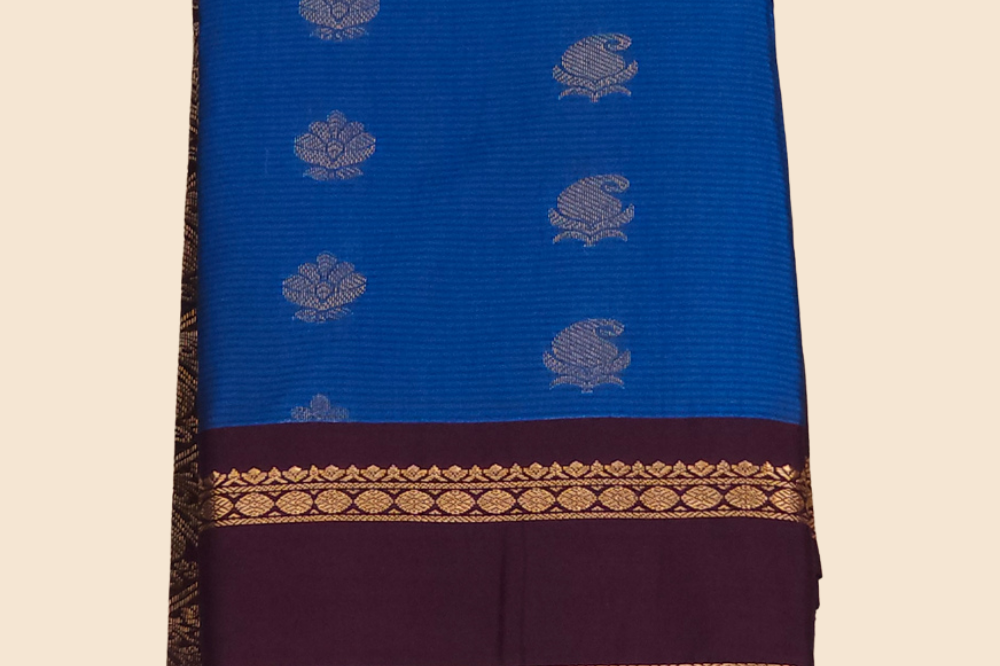 Handloom semi Gadwal saree featuring rich brocade pallu and contrast blouse
