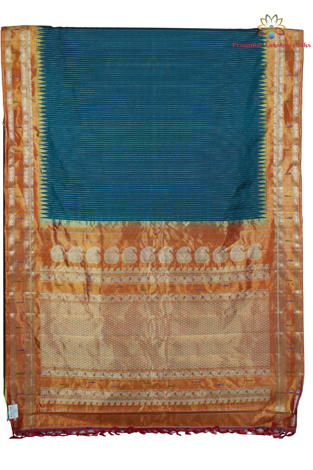 Traditional handloom Gadwal pure silk saree with zari woven tissue borders suitable for weddings.
