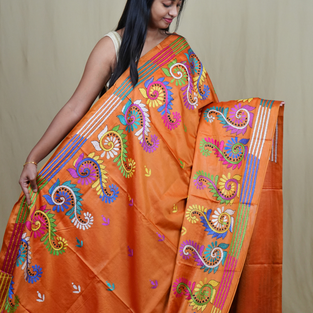 Elegant silk saree featuring Kantha work borders and detailed Kantha pallu design.