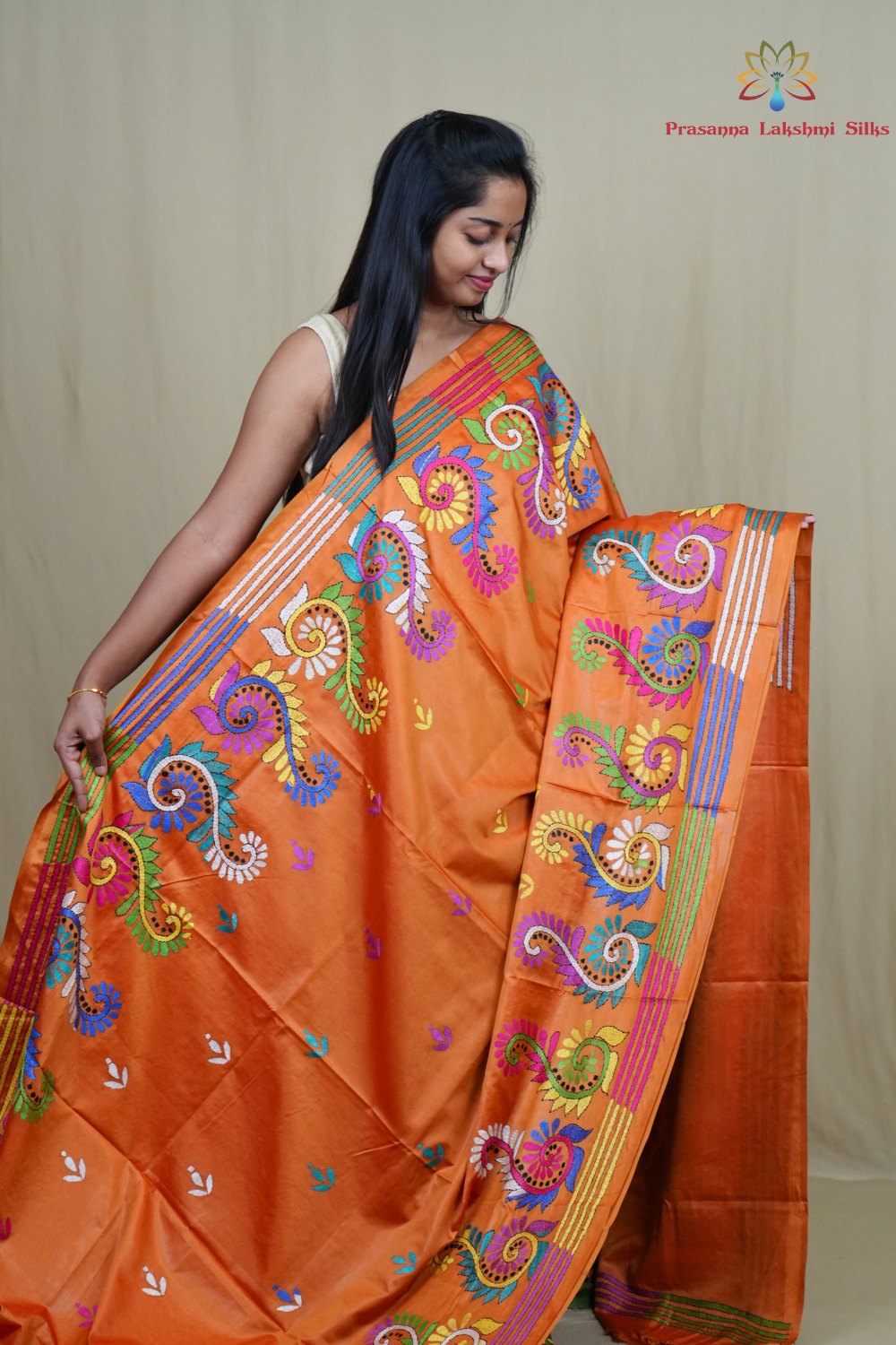 Elegant silk saree featuring Kantha work borders and detailed Kantha pallu design.
