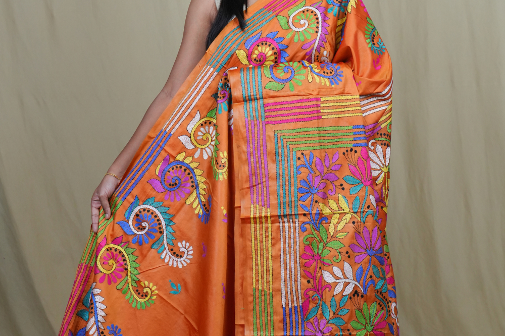 Semi Bangalore silk saree with all-over hand Kantha work and rich embroidered pallu.