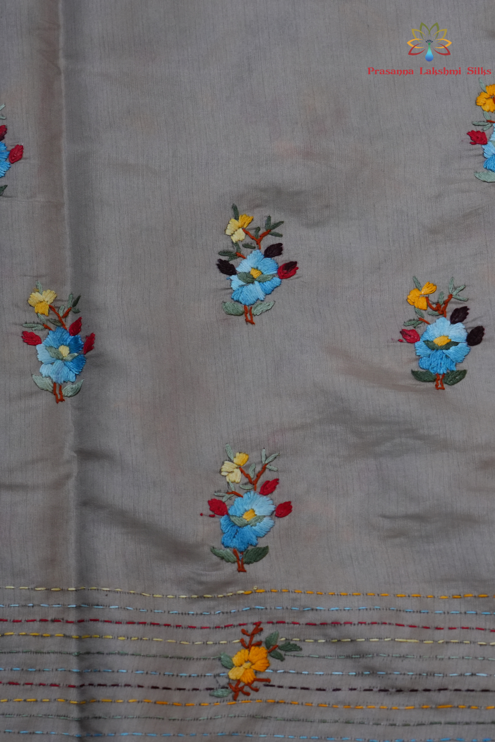 Elegant Tussar saree featuring thread woven Parsi work borders and running blouse piece.
