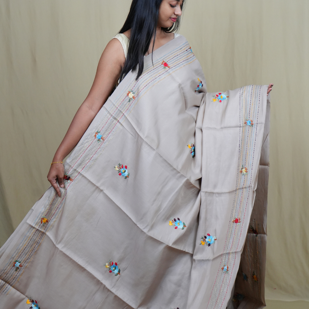 Traditional semi Tussar saree suitable for festive occasions with intricate Parsi work detailing.