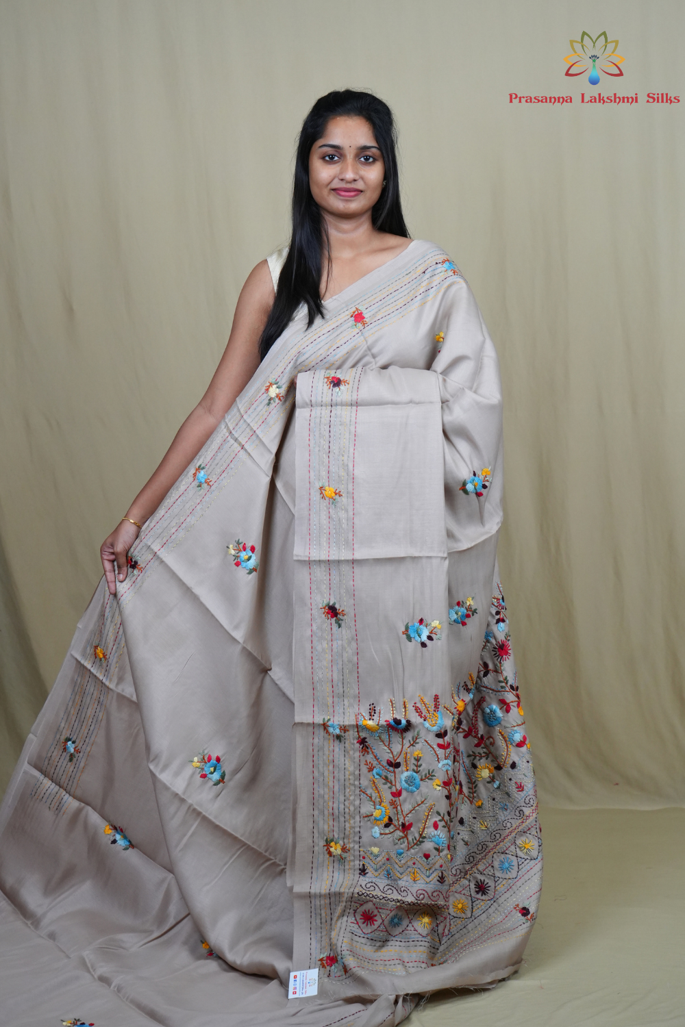 Semi Tussar saree with all-over thread woven motifs and rich Parsi work pallu.