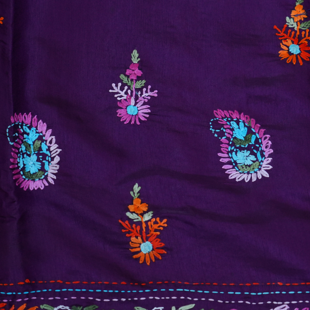 Elegant Tussar saree featuring thread woven Parsi work borders and running blouse piece.
