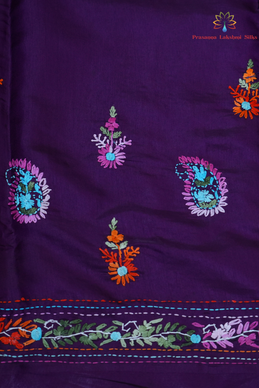 Elegant Tussar saree featuring thread woven Parsi work borders and running blouse piece.
