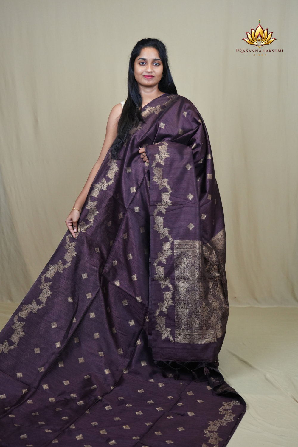 Semi Dupion Silk Saree with all-over zari woven motifs, rich brocade pallu, and elegant zari borders.
