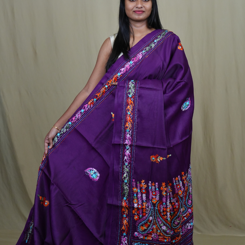 Semi Tussar saree with all-over thread woven motifs and rich Parsi work pallu.
