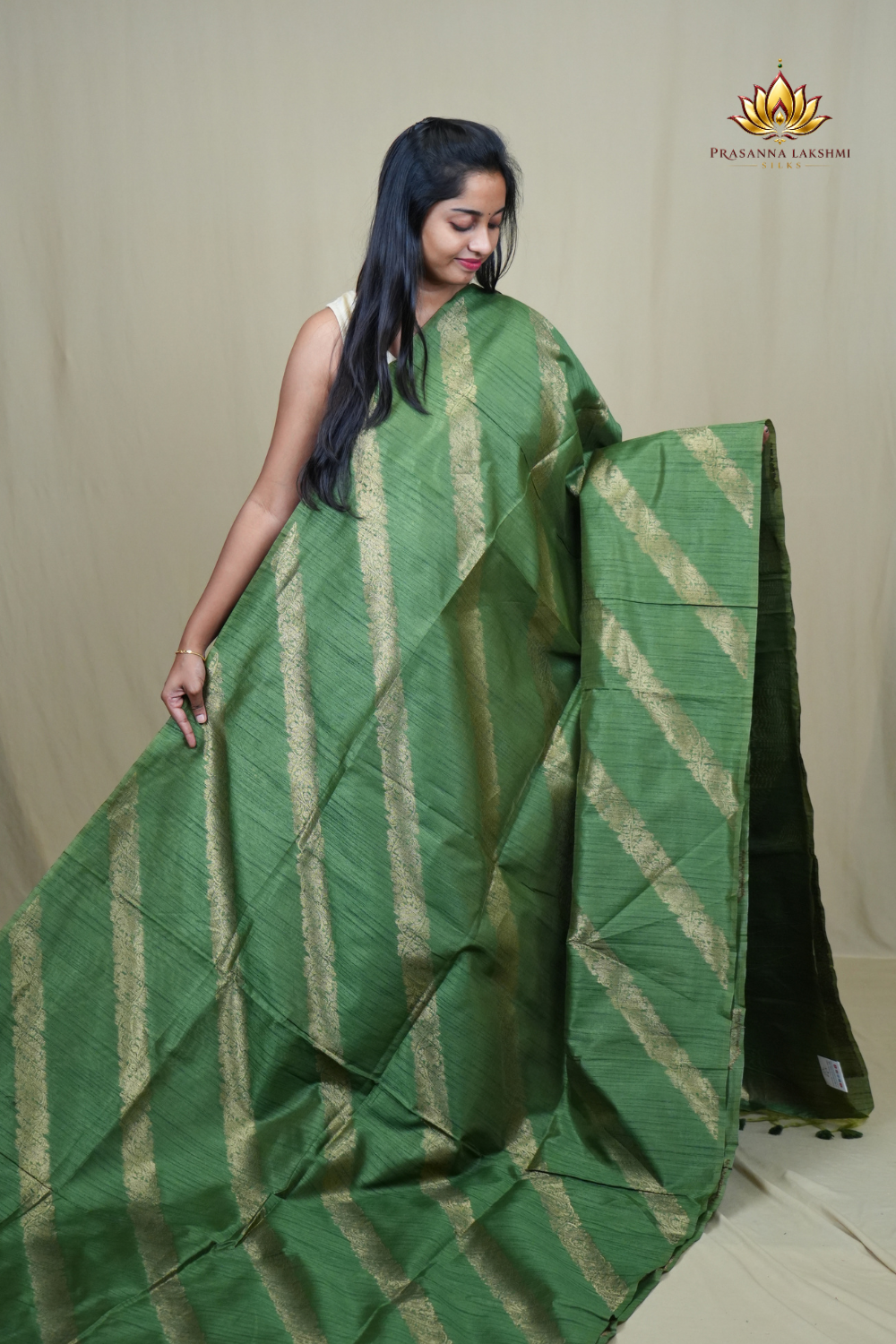 Premium Semi Dupion Silk Saree featuring intricate zari weaving, luxurious brocade pallu, and matching running blouse.
