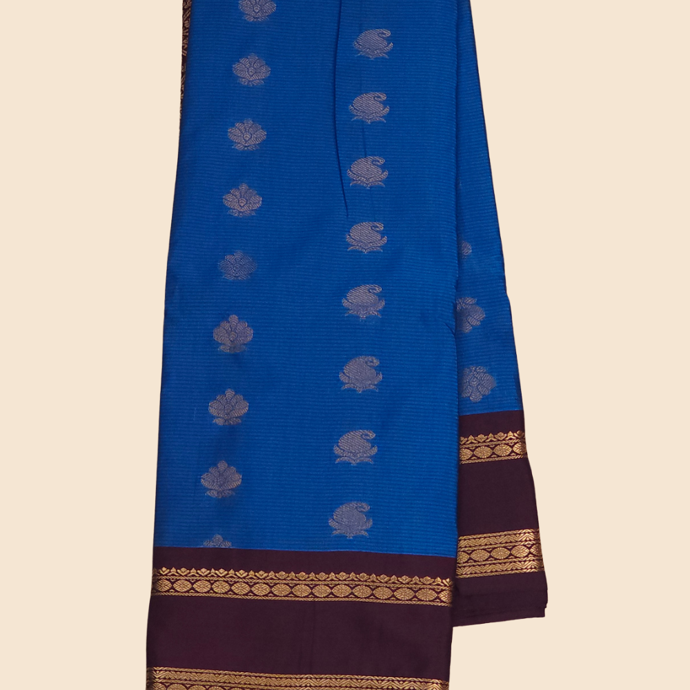 Festive semi Gadwal saree with zari stripe detailing and woven gap border finish