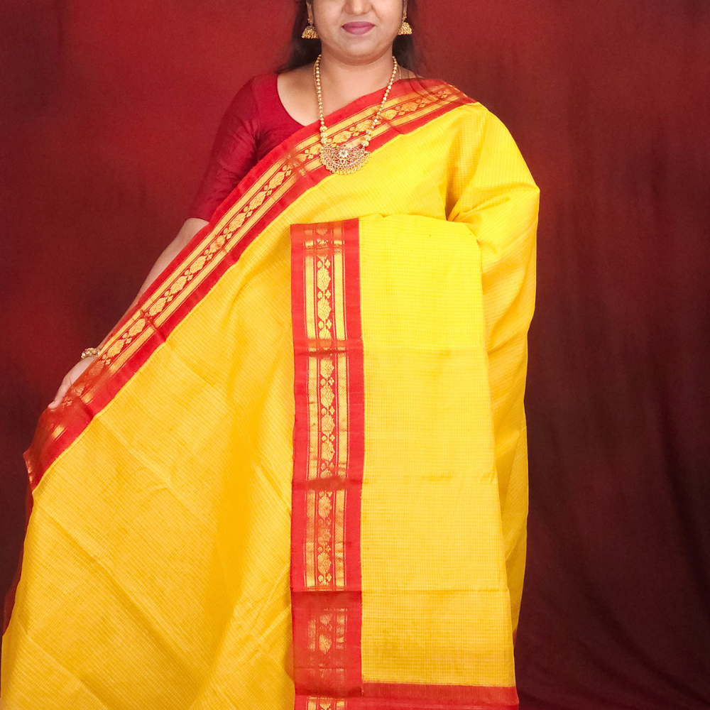 Lightweight Gadwal cotton saree featuring elegant zari border and striped pallu design.
