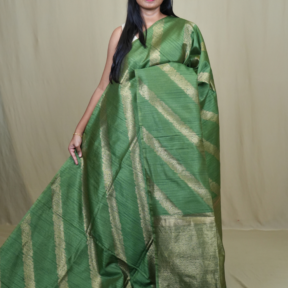 Semi Dupion Silk Saree with all-over zari woven motifs, rich brocade pallu, and elegant zari borders.

