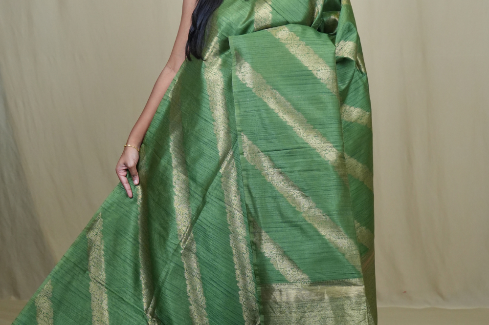 Semi Dupion Silk Saree with all-over zari woven motifs, rich brocade pallu, and elegant zari borders.
