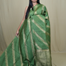 Semi Dupion Silk Saree with all-over zari woven motifs, rich brocade pallu, and elegant zari borders.
