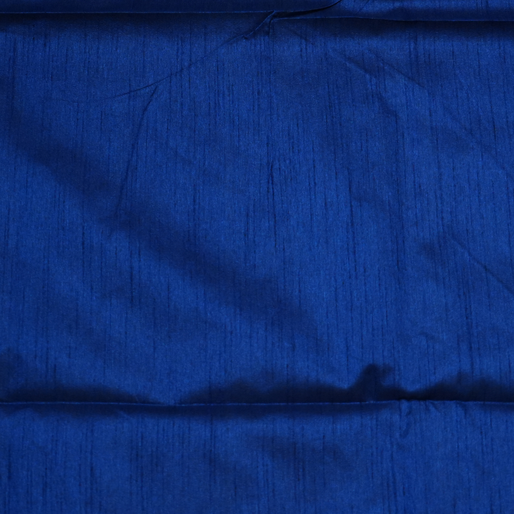 Premium Semi Dupion Silk Saree featuring intricate zari weaving, luxurious brocade pallu, and matching running blouse.
