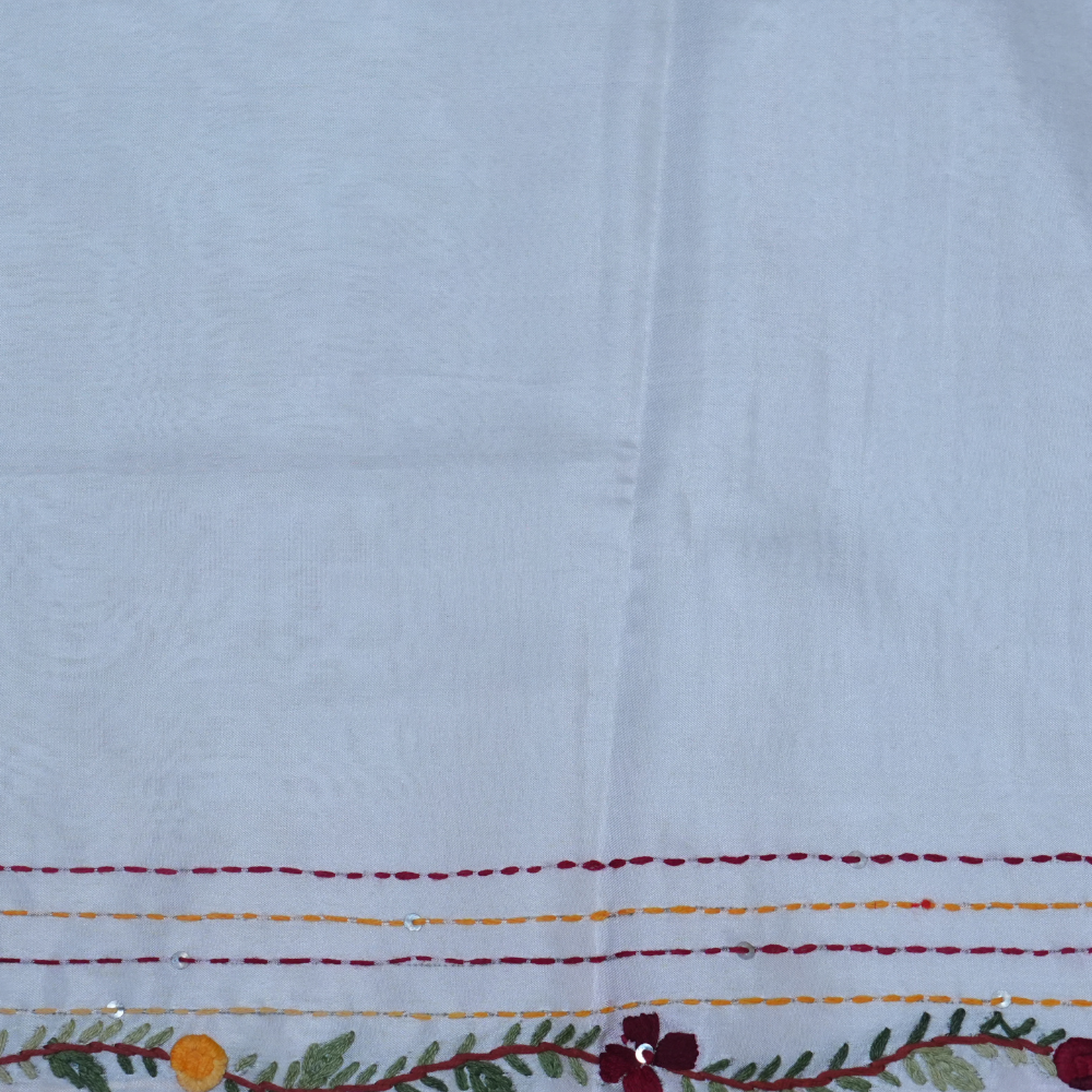 Elegant Tussar saree featuring thread woven Parsi work borders and running blouse piece.
