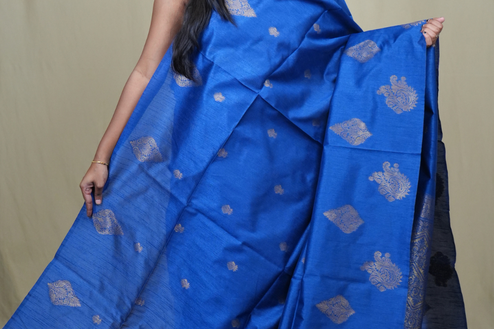 Traditional Semi Dupion Saree with woven zari motifs, ornate borders, and rich brocade pallu for weddings and festive occasions.
