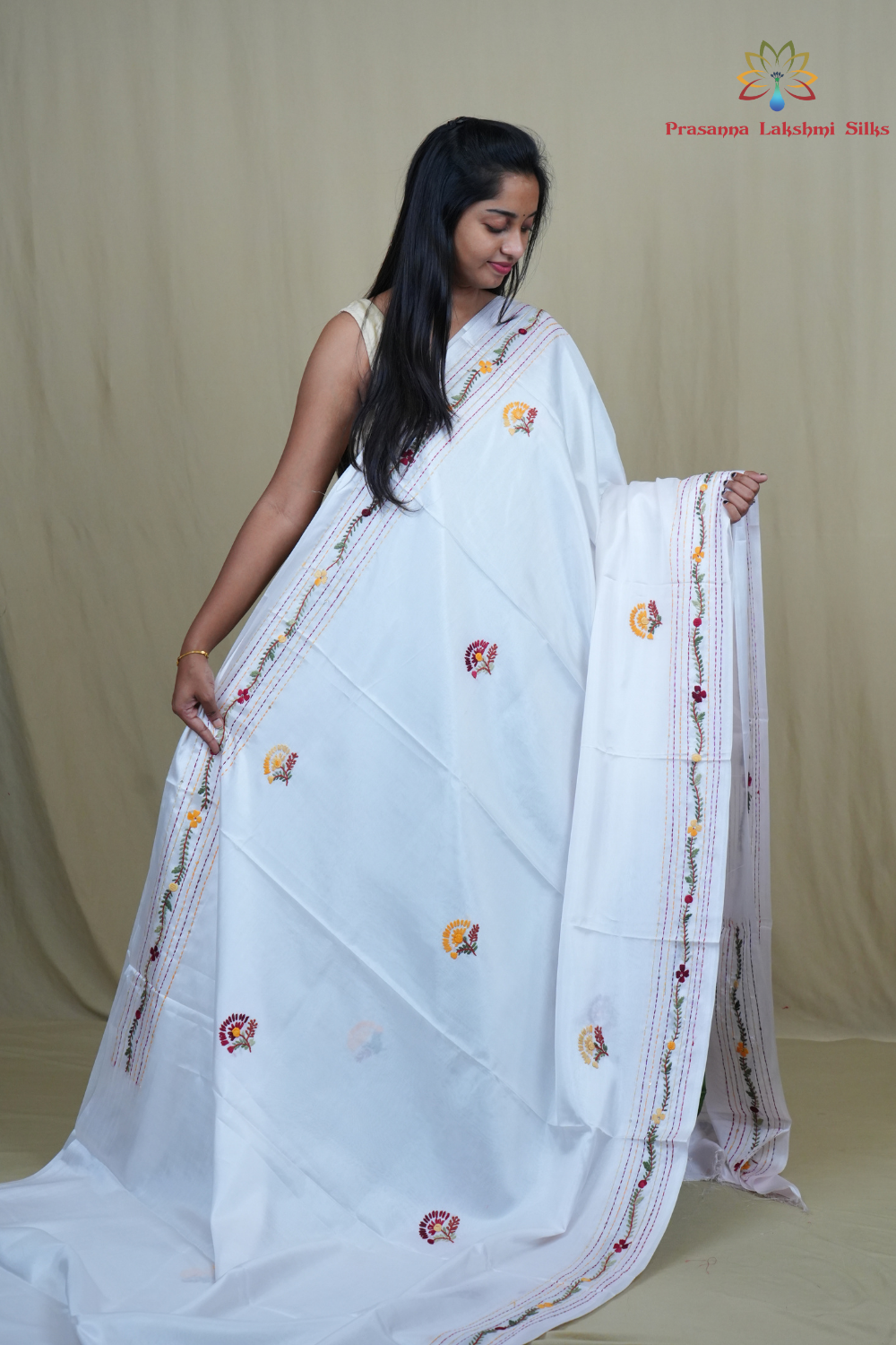 Traditional semi Tussar saree suitable for festive occasions with intricate Parsi work detailing.