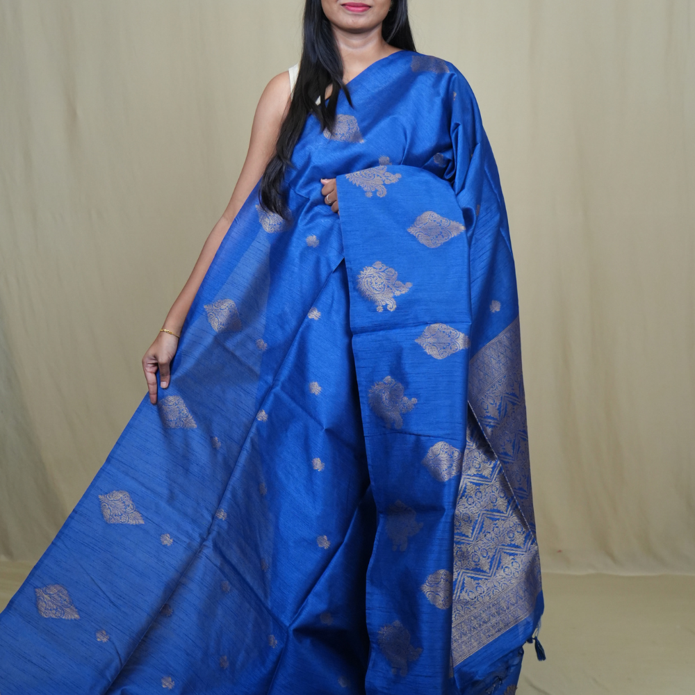 Semi Dupion Silk Saree with all-over zari woven motifs, rich brocade pallu, and elegant zari borders.
