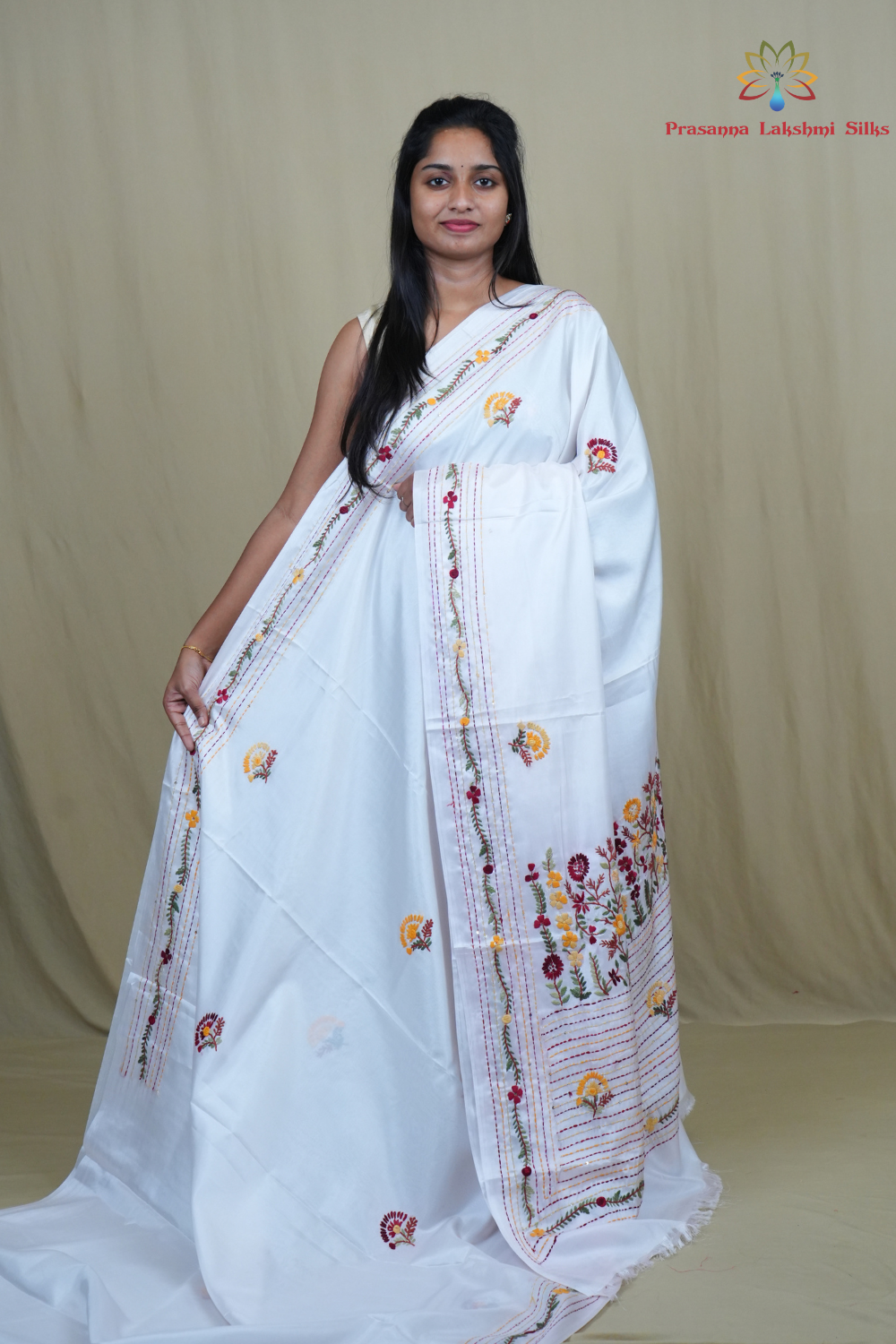 Semi Tussar saree with all-over thread woven motifs and rich Parsi work pallu.
