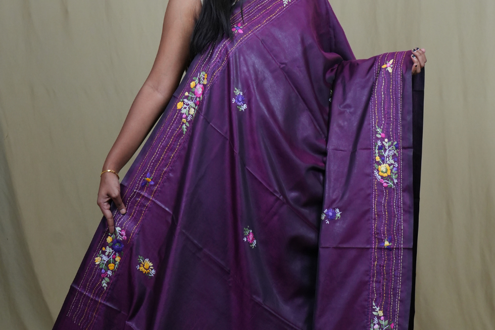 Traditional semi Tussar saree suitable for festive occasions with intricate Parsi work detailing.