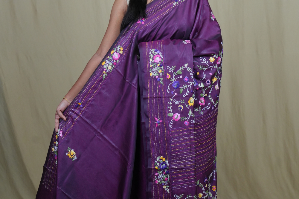 Semi Tussar saree with all-over thread woven motifs and rich Parsi work pallu.
