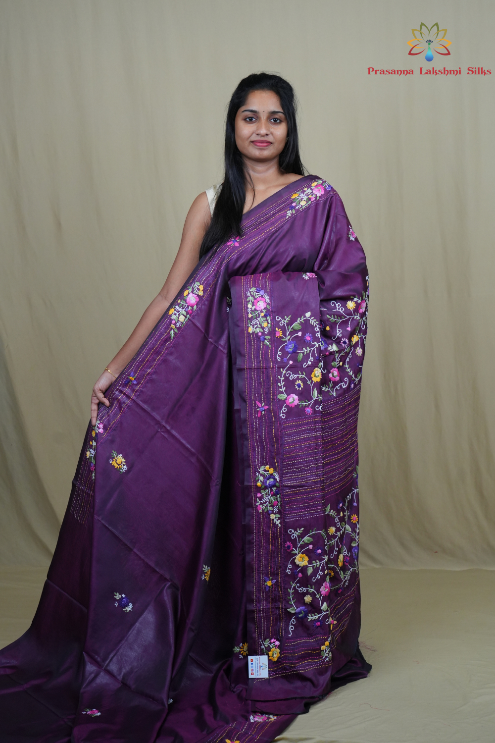 Semi Tussar saree with all-over thread woven motifs and rich Parsi work pallu.
