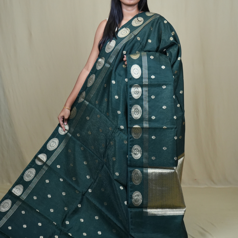 1. Elegant Banarasi Tissue Saree with all-over zari motifs, designer borders, and rich tissue brocade pallu.

