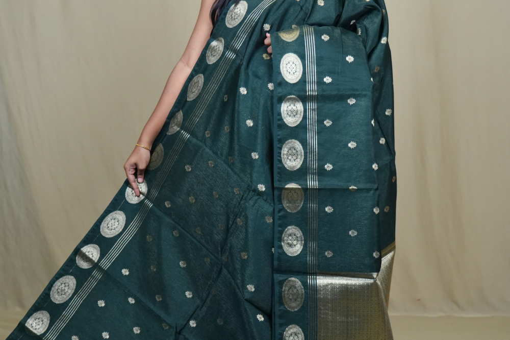 1. Elegant Banarasi Tissue Saree with all-over zari motifs, designer borders, and rich tissue brocade pallu.
