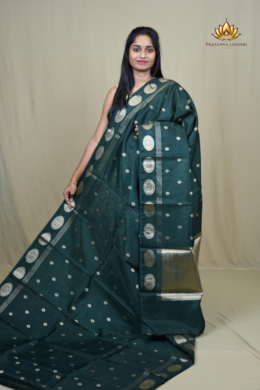1. Elegant Banarasi Tissue Saree with all-over zari motifs, designer borders, and rich tissue brocade pallu.
