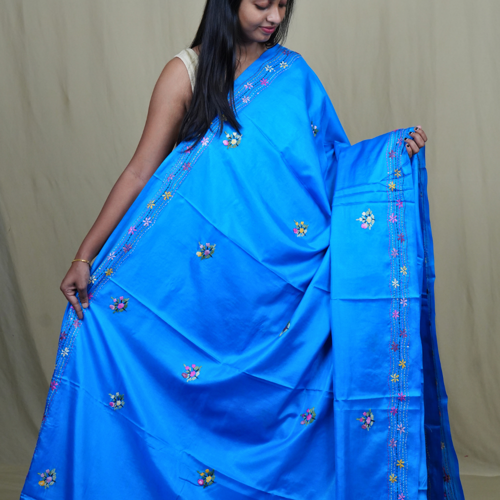Traditional semi Tussar saree suitable for festive occasions with intricate Parsi work detailing.