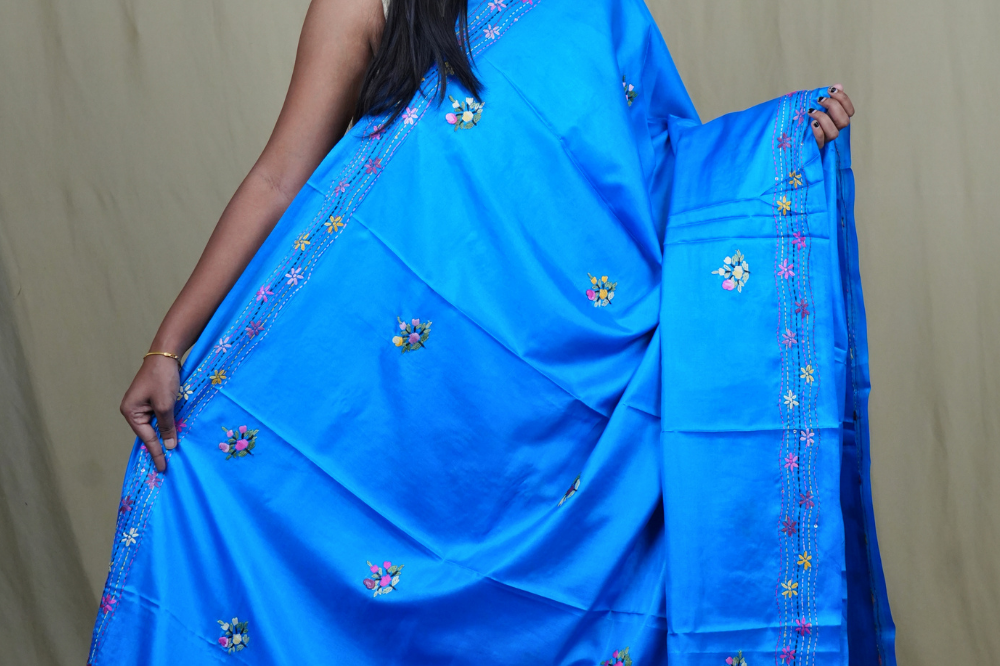 Traditional semi Tussar saree suitable for festive occasions with intricate Parsi work detailing.