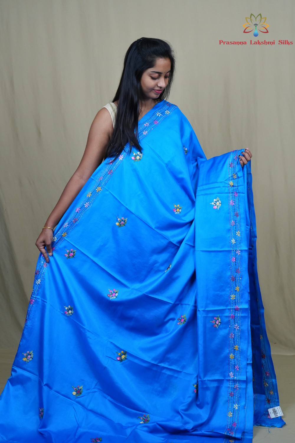 Traditional semi Tussar saree suitable for festive occasions with intricate Parsi work detailing.