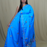 Semi Tussar saree with all-over thread woven motifs and rich Parsi work pallu.
